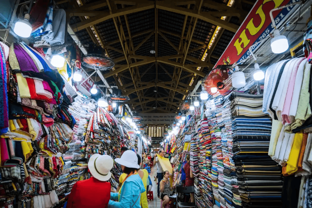 Tan Dinh Market is a true local experience, known for its diverse selection of fabrics (Source: Jackfruit Adventure)